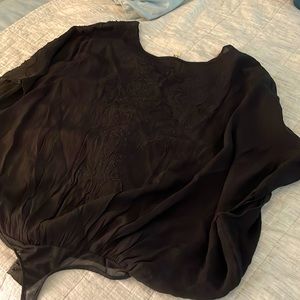 Black Anthropology/Free People leotard with a texture flower design.